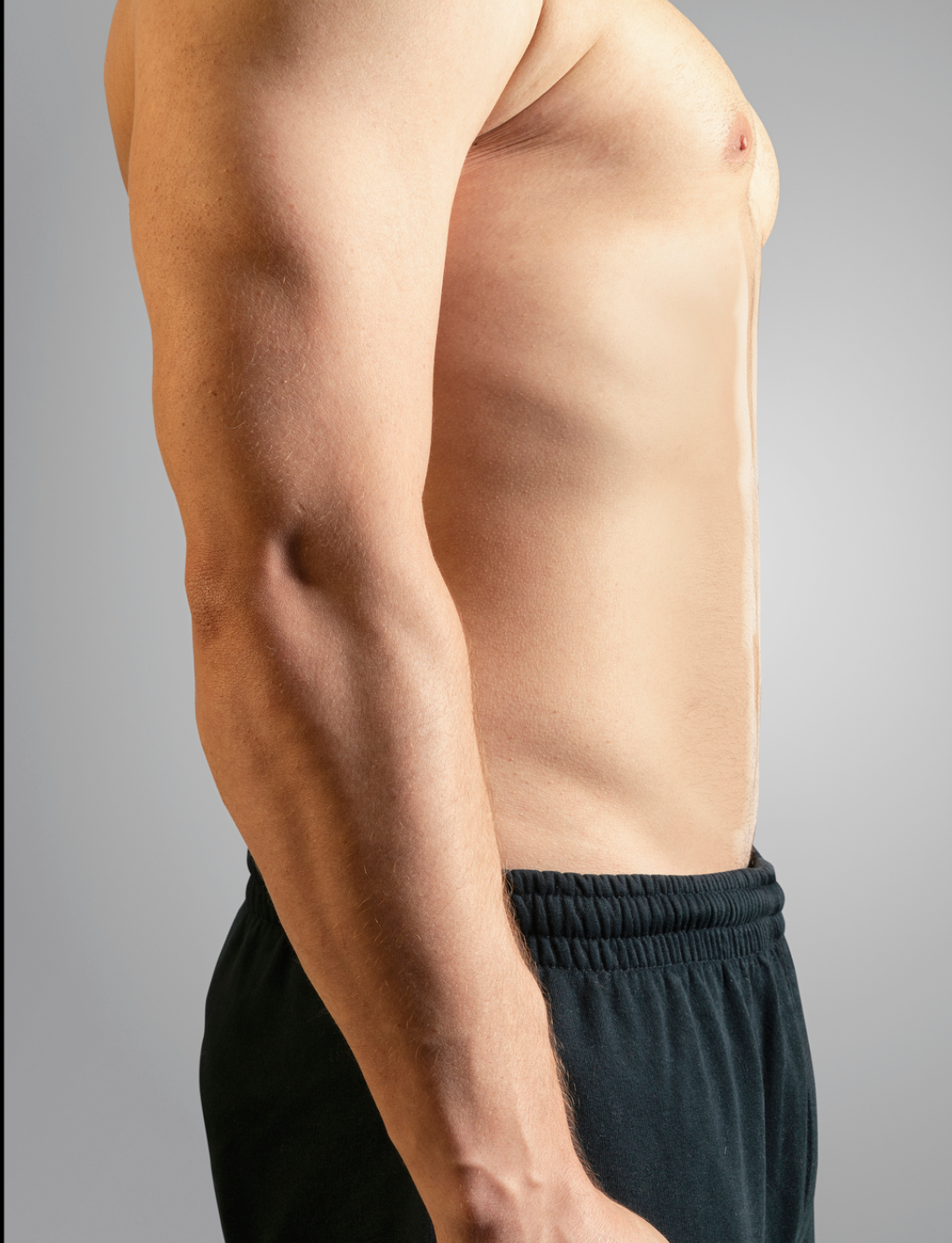 Athletic male in black shorts